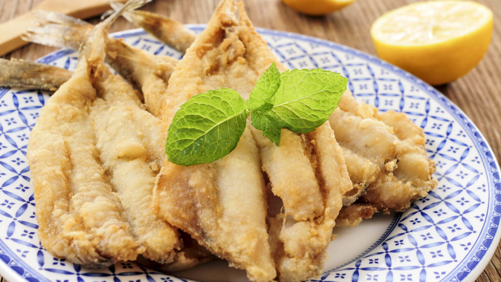 spanish boquerones fritos, battered and fried anchovies typical in Spain