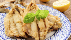 spanish boquerones fritos, battered and fried anchovies typical in Spain
